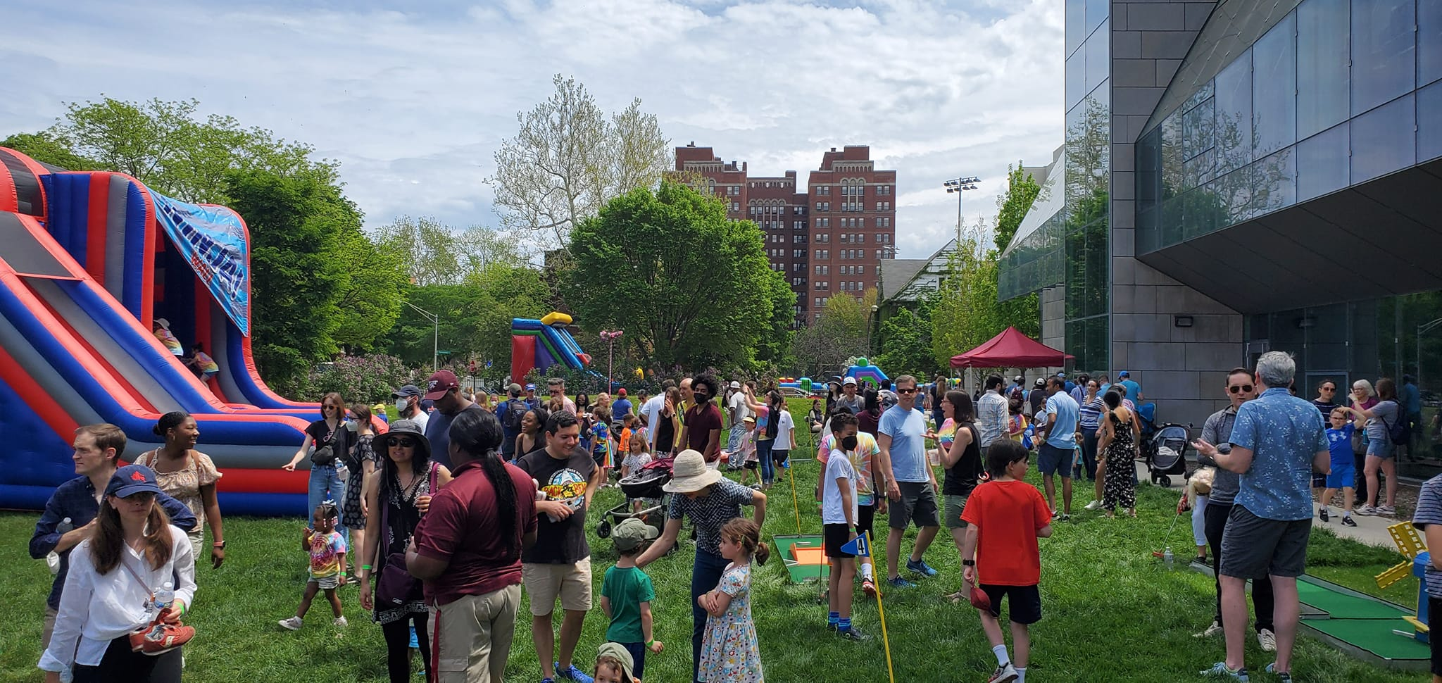 Large outdoor school carnival with multiple inflatables for Chicagoland elementary schools